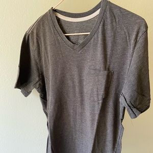 FREE WITH ANY PURCHASE Men’s gray T-shirt